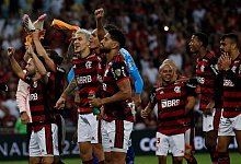 Spieler von Flamengo Rio de Janeiro feiern den 2:1-Sieg. - Bruna Prado/AP/dpa