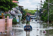 &Uuml;berschwemmungen in Thailand - Foto: Varuth Pongsapipatt/SOPA Images via ZUMA Press Wire/dpa