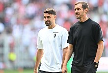 Vincenzo Grifo (l) und Julian Schuster - Carmen Jaspersen/dpa