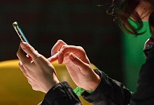 Mobilfunk MMS Nachrichten - Jens Kalaene/dpa-Zentralbild/dpa-tmn