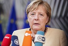 Merkel - Foto: Olivier Hoslet/EPA/AP/dpa