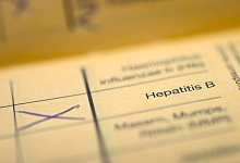 Impfpass - Foto: Daniel Naupold/dpa