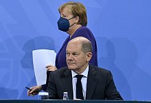 Angela Merkel und Olaf Scholz - Foto: John Macdougall/AFP-Pool/dpa