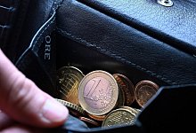 Geldbeutel - Federico Gambarini/dpa/dpa-tmn
