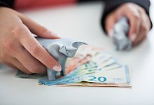 Geld an der B&ouml;rse anlegen - Foto: Christin Klose/dpa-tmn