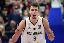 Franz Wagner jubelt nach dem Sieg gegen Polen. - Soeren Stache/dpa