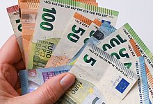 Geld - Patrick Pleul/dpa-Zentralbild/dpa/Illustration