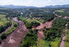 Die Schlammlawine nach dem Dammbruch an der Mine C&oacute;rrego do Feij&atilde;o am 25. Januar 2019 in der N&auml;he der Gemeinde Brumadinho. - Bruno Correia/Agencia Nitro/dpa