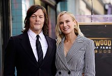 Der Schauspieler Norman Reedus (l) mit seiner Partnerin Diane Kruger. - Chris Pizzello/Invision/AP/dpa