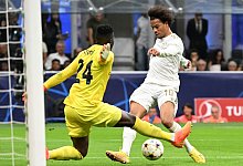 Münchens Leroy Sané (r) in Aktion gegen Mailands Torhüter Andre Onana. - Sven Hoppe/dpa