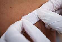 Corona-Impfung - Foto: Christian Charisius/dpa