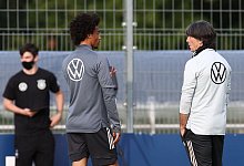 San&eacute; und L&ouml;w - Foto: Christian Charisius/dpa