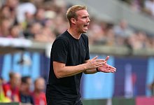 VfL Wolfsburgs Trainer Tommy Stroot - Robert Michael/dpa