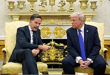 Nato-Generalsekretär Rutte und US-Präsident Trump - Alex Brandon/AP/dpa