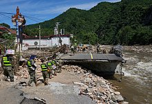 &Uuml;berschwemmungen in China - Ju Huanzong/Xinhua/AP/dpa