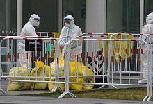 Coronavirus in China - Foto: Ng Han Guan/AP/dpa