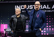 Telekom und Nvidia stellen KI-Fabrik vor - Carsten Koall/dpa