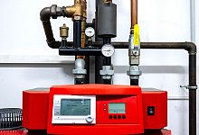 Eine Gasheizung im Keller - Sina Schuldt/dpa