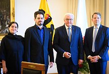 Intendant Wiegand mit Dirigent Shani beim Bundespräsidenten - Bernd von Jutrczenka/dpa