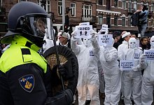 Corona-Proteste in Amsterdam - Foto: Peter Dejong/AP/dpa