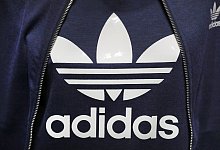Adidas - Foto: Daniel Karmann/dpa
