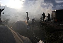 Migranten in Griechenland - Foto: Aggelos Barai/AP/dpa