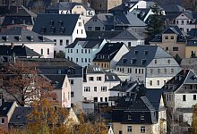 Besonders kräftig zogen die Preise für Wohnimmobilien Ende vergangenen Jahres an. - Jan Woitas/dpa