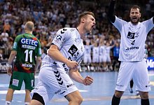 Wollen mit Kiel Meister werden: Nikola Bilyk (M) und Domagoj Duvnjak. - Bernd Thissen/dpa