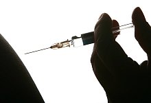 Impfung gegen Gelbfieber - Foto: Ralf Hirschberger/dpa