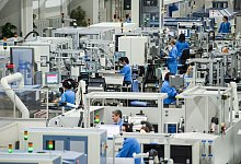 Das Siemens-Werk in Amberg. An diesem Standort wird Technik produziert, mit der Maschinen und Anlagen gesteuert und industrielle Fertigungen automatisiert werden. - picture alliance / dpa