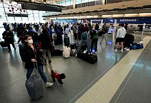 Corona in den USA - Foto: Charles Rex Arbogast/AP/dpa