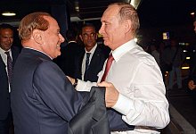 Putin und Berlusconi - Telenews/ANSA/EPA/dpa
