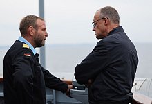 Bundeskanzler Merz besucht Marine - Jens Büttner/dpa