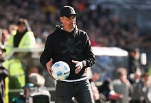 Trainer Alexander Blessin vom FC St. Pauli - Christian Charisius/dpa