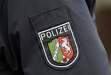 Polizeiwappen von Nordrhein-Westfalen. - Roberto Pfeil/dpa