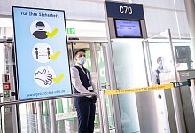 Corona-Regeln an deutschen Flugh&auml;fen - Foto: Marius Becker/dpa/dpa-tmn