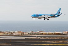 Ferienflieger - Foto: ARTuro Jimenez/dpa