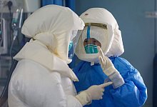 Coronavirus - China - Foto: Uncredited/CHINATOPIX/AP/dpa