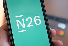 Smartphone-Bank N26 - Foto: Christophe Gateau/dpa