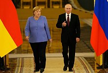 Kanzlerin Merkel in Russland - Foto: Alexander Zemlianichenko/AP/dpa