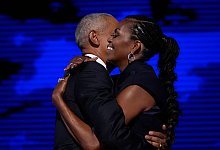 Barack und Michelle Obama - Brynn Anderson/AP