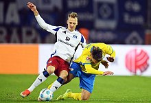 Sebastian Schonlau (l) - Swen Pförtner/dpa