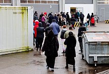 Fl&uuml;chtlinge - Frank Molter/dpa