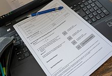 Schulzeugnis - Foto: Ben Immel/dpa