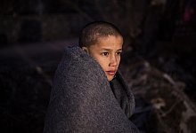 Gefl&uuml;chteter Junge - Foto: Angelos Tzortzinis/dpa