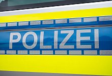 Illustration - Polizeiwagen - Daniel Vogl/dpa