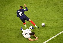 Hummels und Mbappé - Christian Charisius/dpa