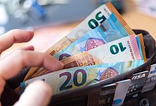 Geld - Foto: Monika Skolimowska/Illustration