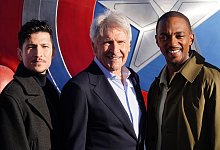 Danny Ramirez (l-r), Harrison Ford und Anthony Mackie - Ian West/PA Wire/dpa
