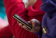 Kinderpornografie auf dem Handy - Armin Weigel/dpa